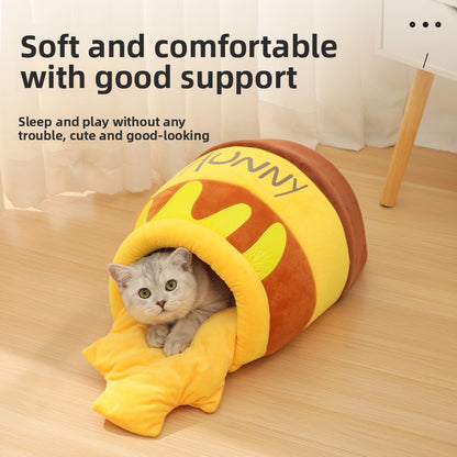 Cat nest bed in yellow and brown with plush tunnel opening, cat sleeping inside