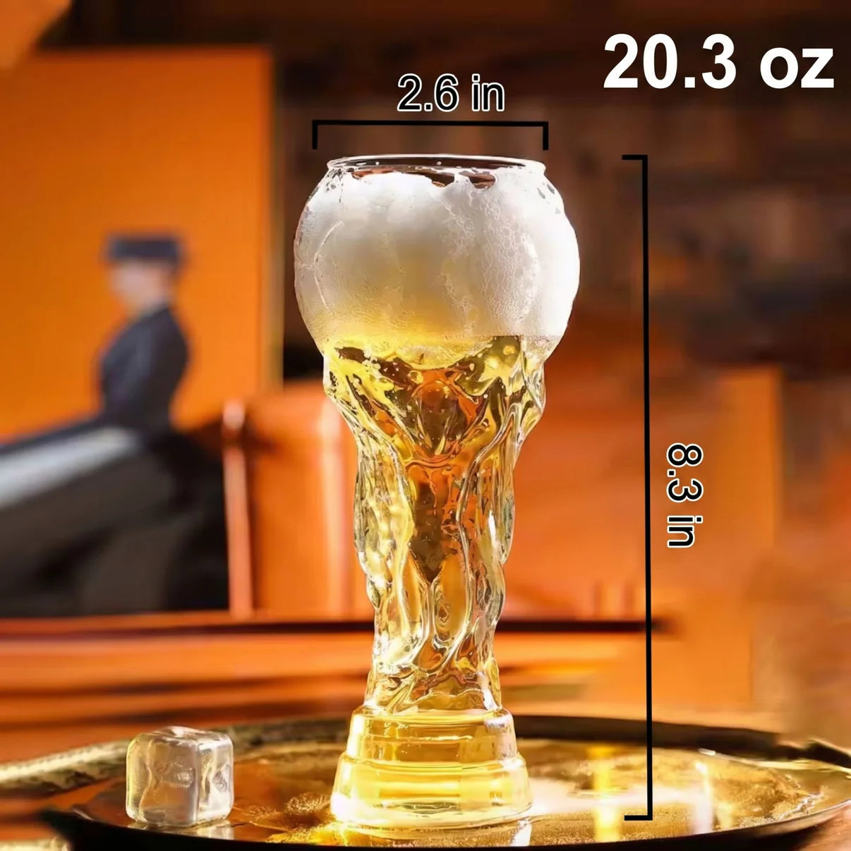 Crystal trophy glass with amber drink, rounded top and thick base