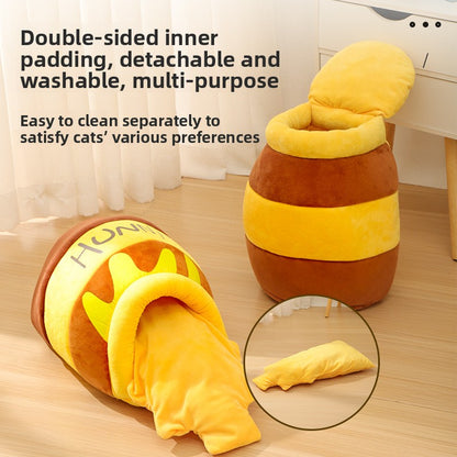 Cat nest bed with brown outer shell and yellow removable inner cushion on floor