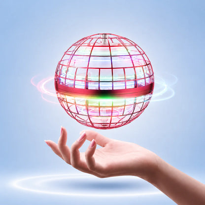 Red LED orb drone with rainbow glow floating above an open hand