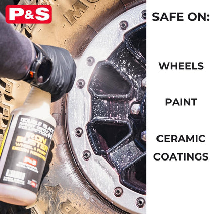 Iron remover bottle spraying a wheel rim with foamy white residue