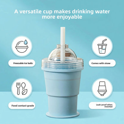 Light-blue silicone ice cup with clear dome lid and straw
