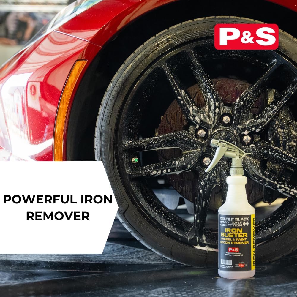 Iron remover bottle in front of a wheel with speckled residue on the rim